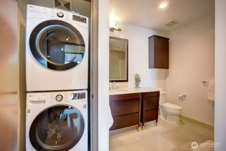 Stackable Washer/Dryer only 2 years old plus built-in storage behind door