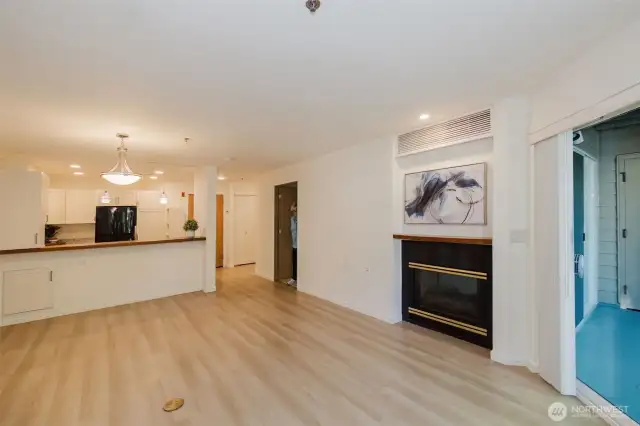 Living room -with see-thru gas fireplace into bedroom.