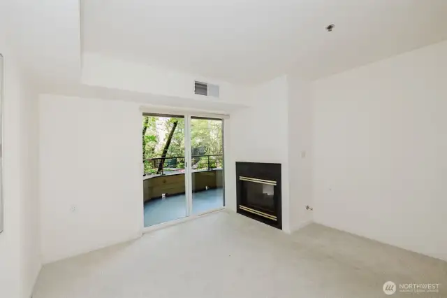 Bedroom with gas fireplace (see through to living room)