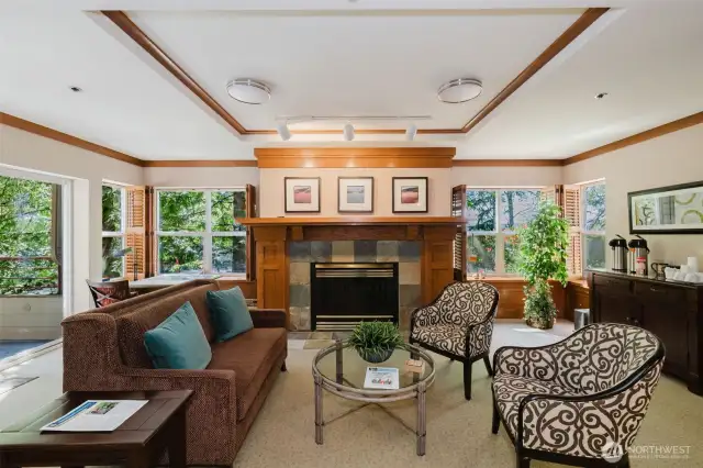 Main lobby sitting area features cozy gas fireplace