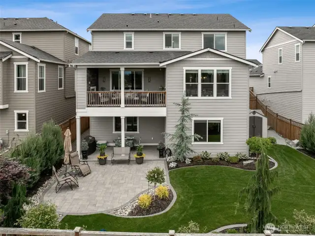 View of back of home showing all 3 stories and a perfect spot to enjoy the amazing view