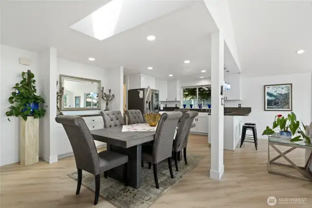 Dining Room has built-in buffet. Laundry Room, Half Bath and Garage access to left of Kitchen.