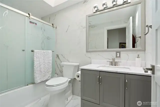 Secondary Bath has been updated and also has a skylight.