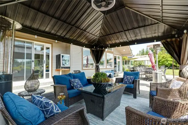 Enjoy the outdoors under the Gazebo with fan for those warm summer days.