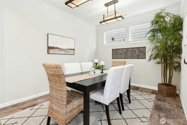 Large dining room with elegant lighting.