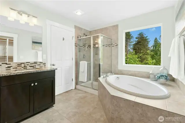 Imagine a bubble bath in this huge tub with a view.