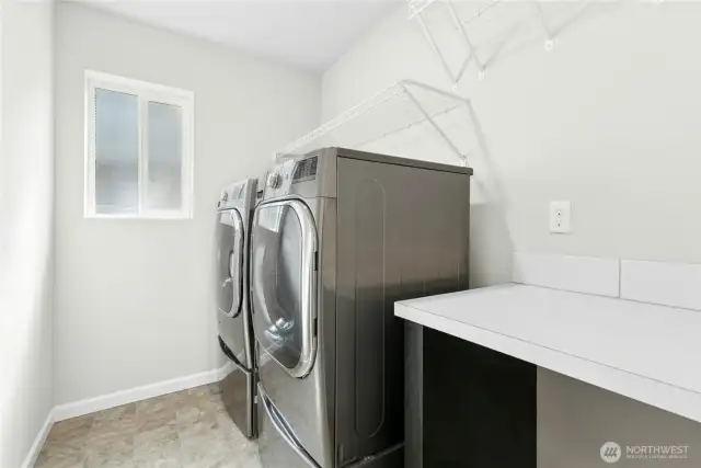 Washer and dryer stay with the home.  Don't forget the laundry folding table.