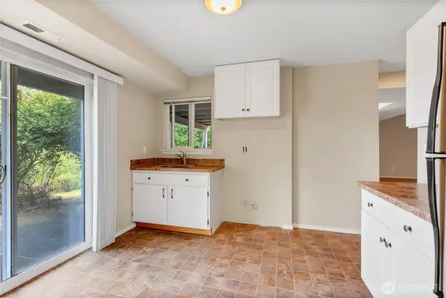 Kitchenette (lower level) w/slider to outside patio