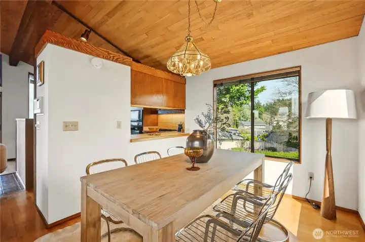 Dining room adjacent to family room with pass through to kitchen