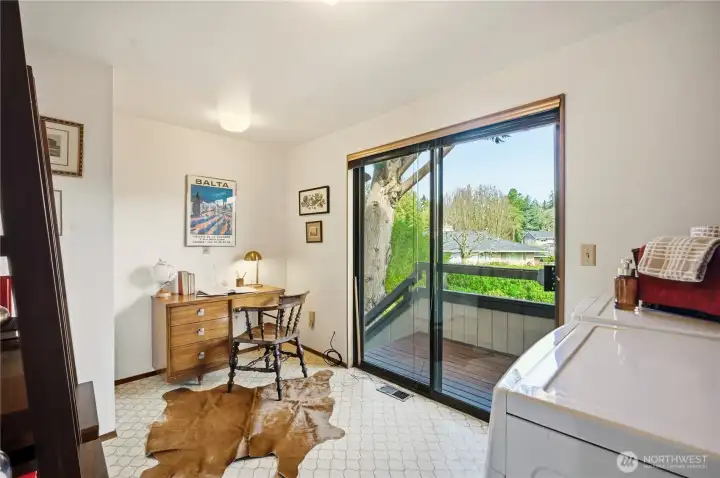 Second floor office/laundry with access to backyard and patio