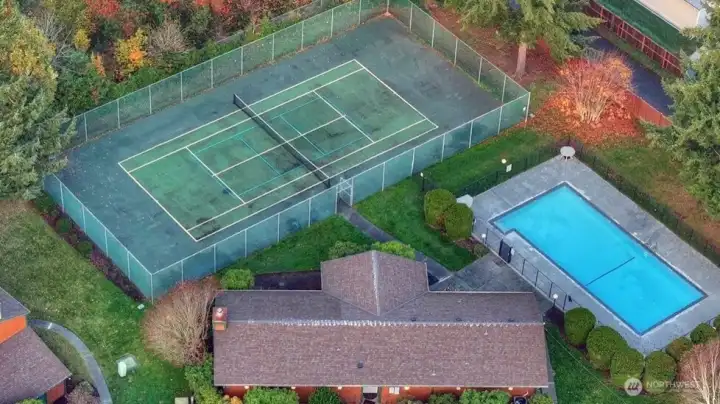 Sky View of Full Size Community Pool and Tennis Court