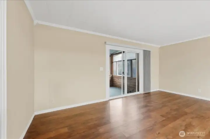 Family room great for gatherings and living. Door opens to private sunroom