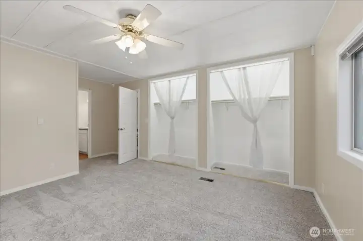 Primary bedroom suite on far end o home very private