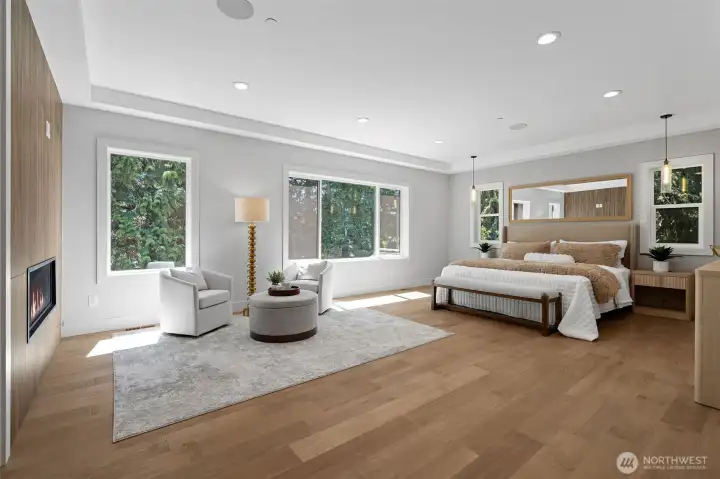 Escape to your Primary Suite with a cozy gas fireplace and lots of privacy courtesy of your old growth Fir trees.