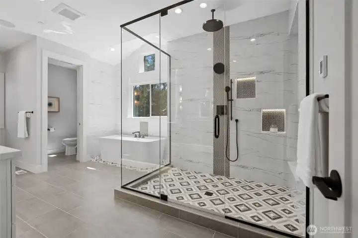 Spa like Luxe 5 piece bathroom to relax after a long day of activities.