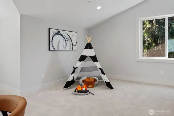Everyone enjoys playing with a Highland cow in front of the campfire at your mini campsite.