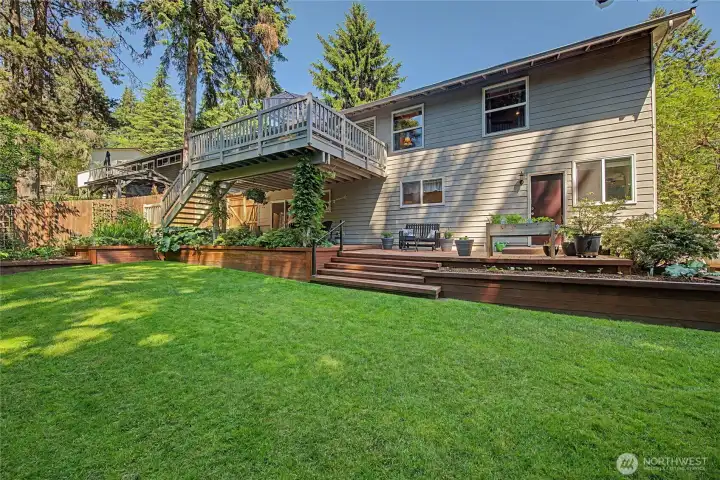 Rear view of well maintained home.