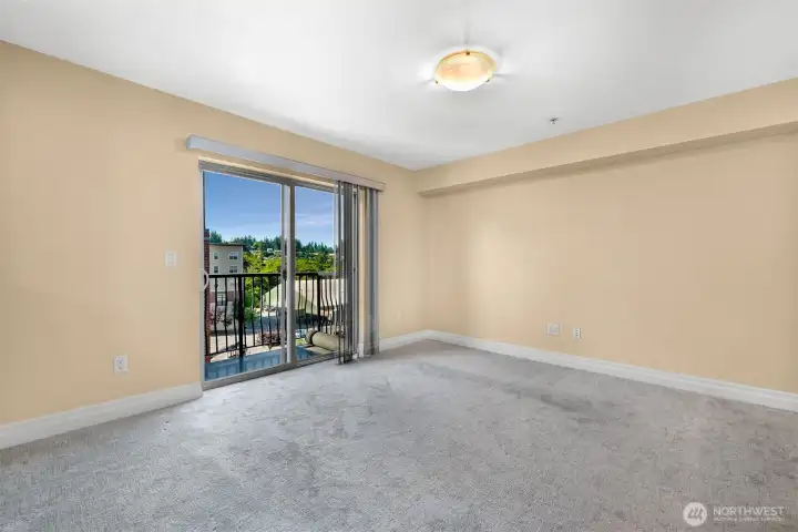 Spacious living room and a deck with views