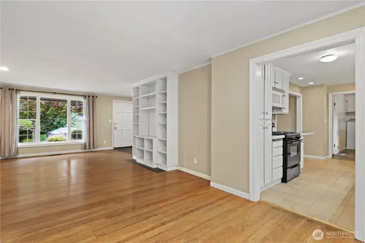 Dining looking towards front door & living room; kitchen to right