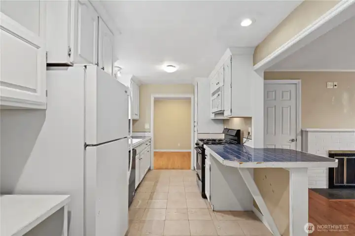 Small eating space island looking into the family room