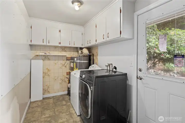 Utility Room w/ back door access to the covered deck