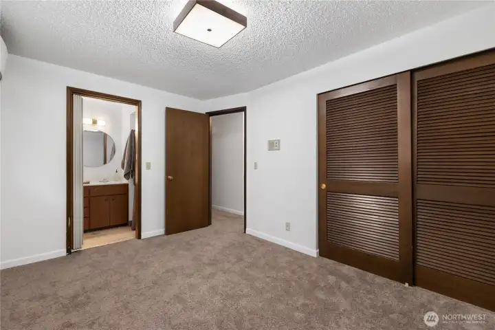 Primary bedroom with a 3/4 bath ensuite. Primary bedroom with a 3/4 bath ensuite.
