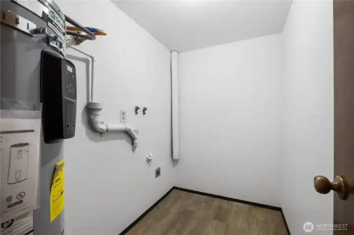Downstairs laundry and utility room. Downstairs laundry and utility room.