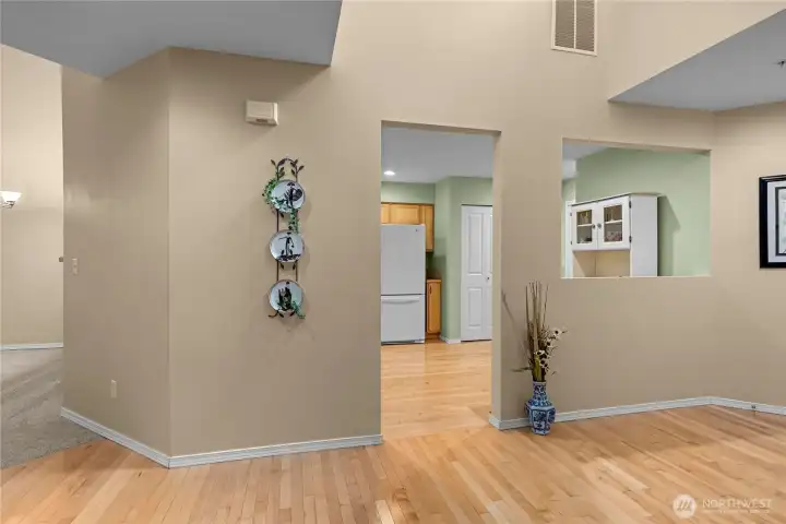 dramatic entry with vaulted ceiling and solid maple floors dramatic entry with vaulted ceiling and solid maple floors