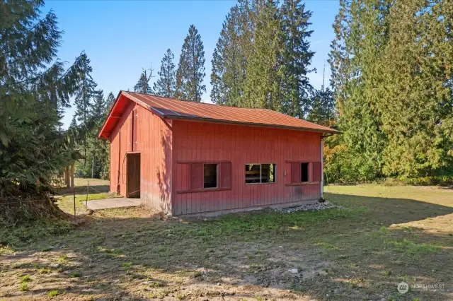Three stall barn with insulated tack room and hay loft.