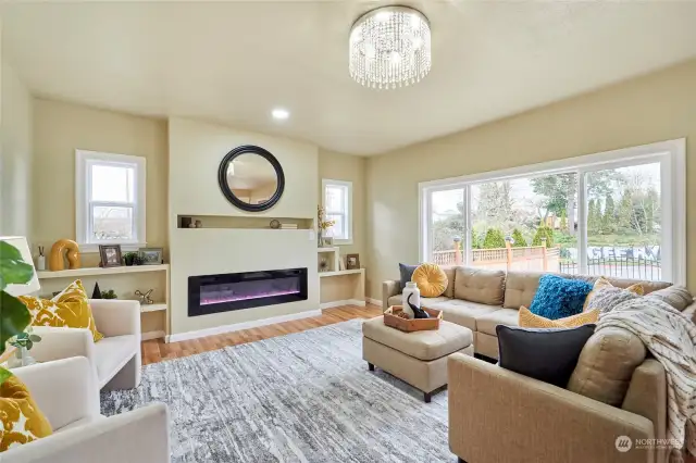 Living Room with Recessed & Wall Mounted, Multi Color Remote Control Electric Fireplace.