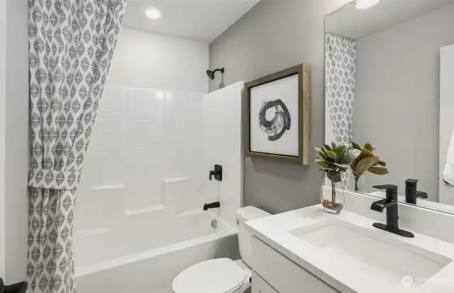 Hall bath on 3rd floor. All pictures are of our staged model homes, finishes will vary.