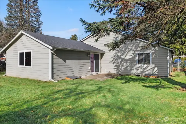 Sunny backyard with room to garden. Great space for outdoor fun and summer BBQ's.