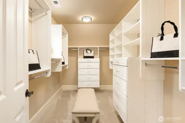 Primary custom closet system w/cedar lined drawers