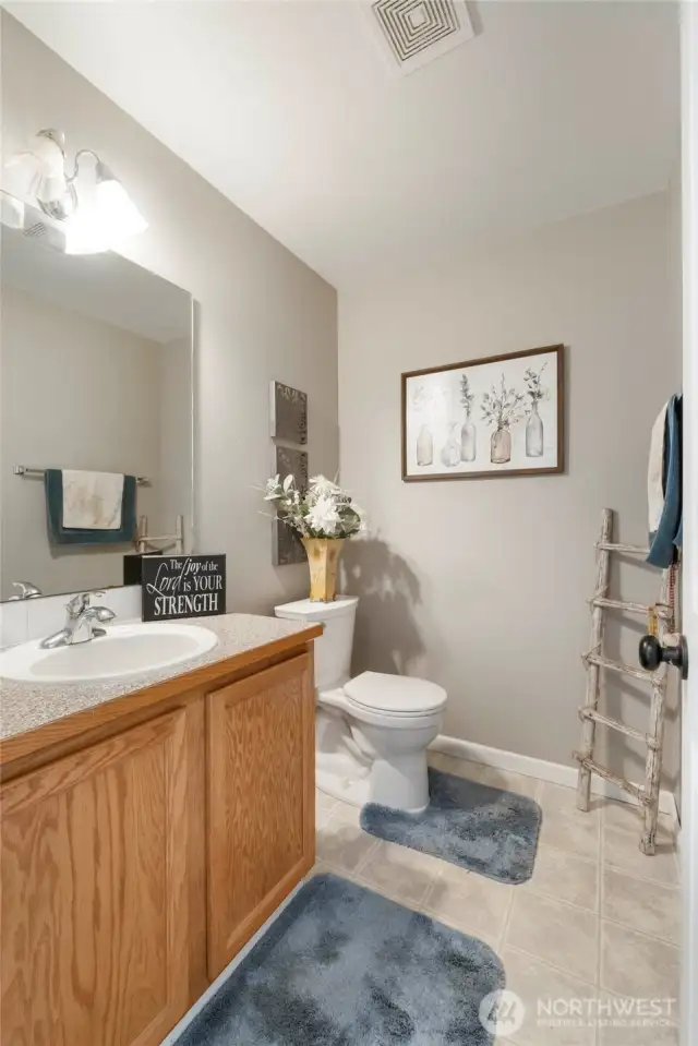 Powder room conveniently located on the main level.
