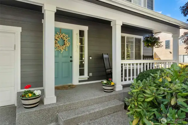 Happy vibes overwhelm you as you approach the entry! Tasteful accented front entry and a spot for morning coffee on the front porch.