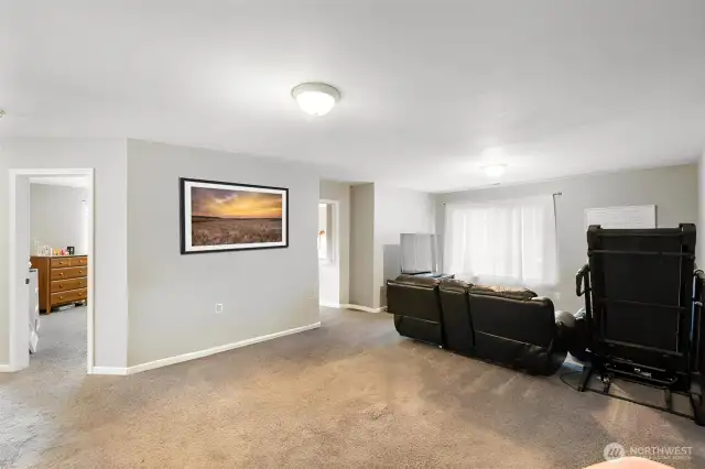 The bonus room is centrally located giving ample space for separation of bedrooms and another place to relax or create an at home office or work-out room.