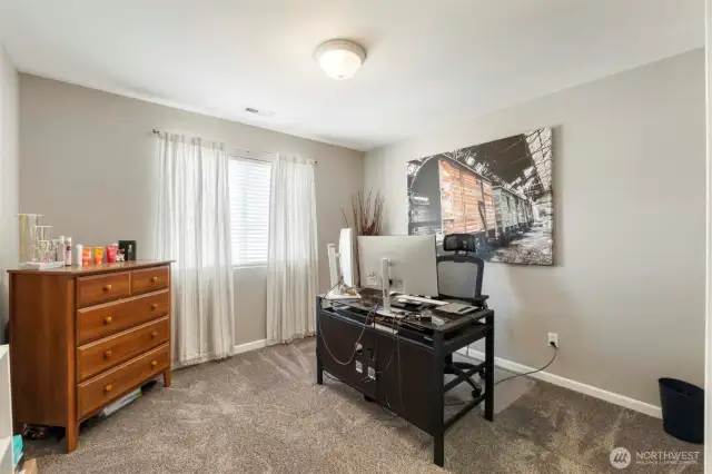 Four of four Guest bedrooms currently utilized as an office.