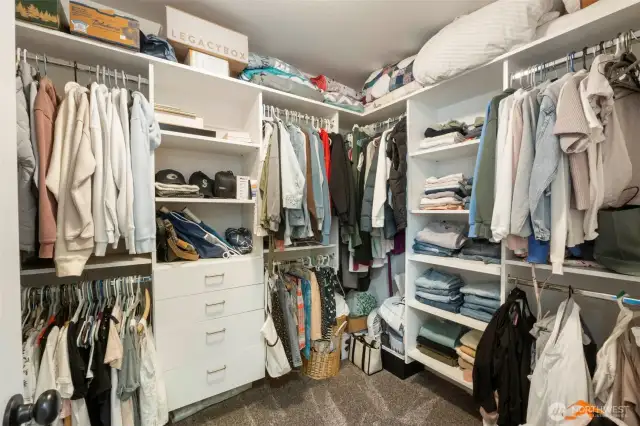 Closet organizer in each walk-in closet of the Primary suite.