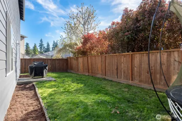 Fenced backyard is ready for those summer BBQS!