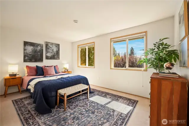 Large bedroom upstairs faces the backyard.