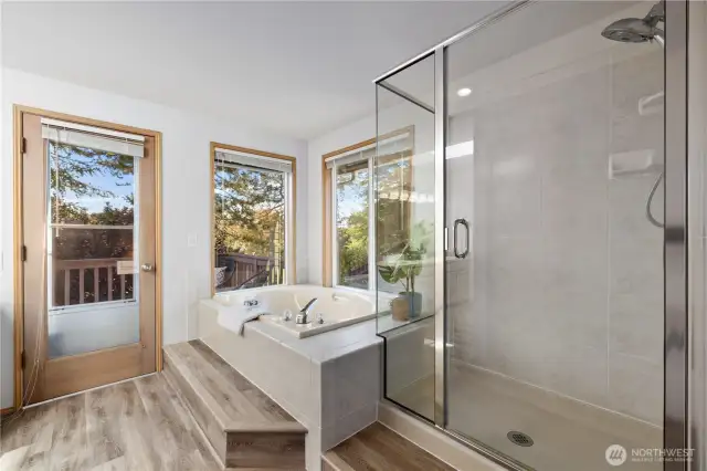 Primary bathroom off the bedroom has it's own balcony!