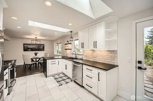 Updated kitchen with great countertop space & access to rear patio