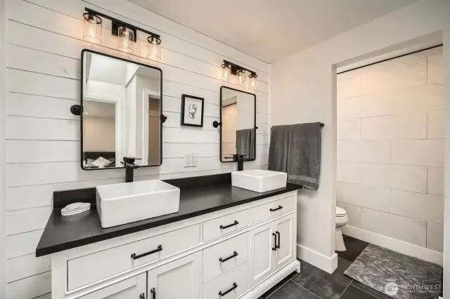 Updated primary bath w/ tile shower