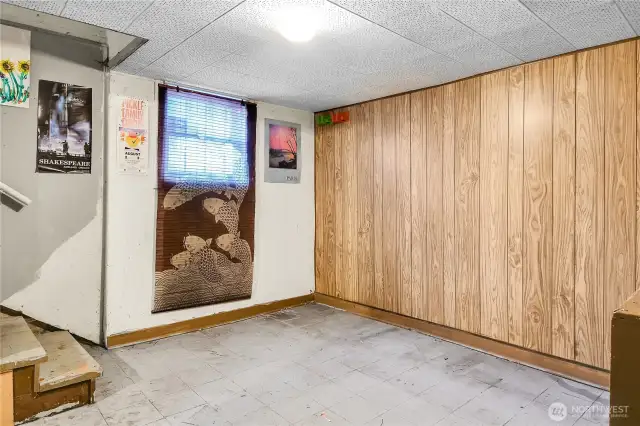 Enter the basement from the kitchen. Lots of room for expansion of usable living space.