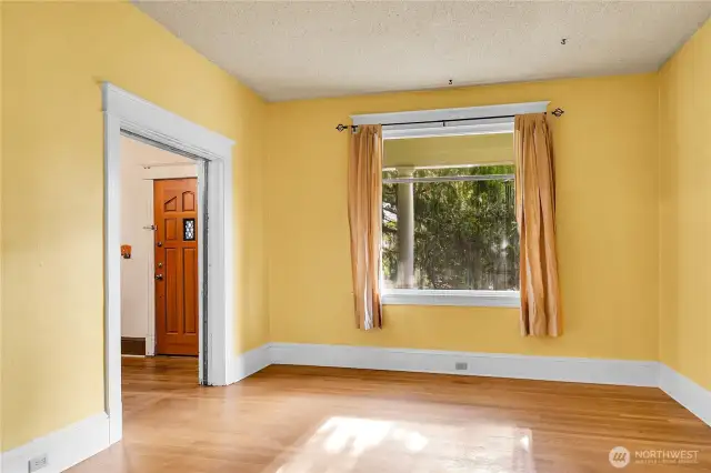 Intact pocket door to the parlour/living room.