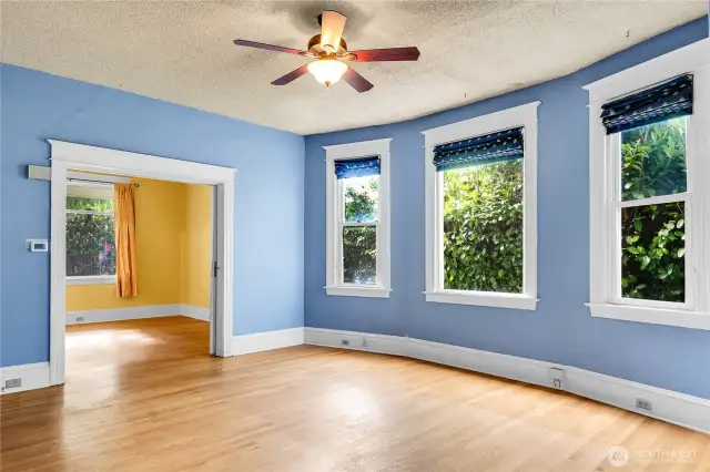 Enormous formal dining room with intact pocket doors.