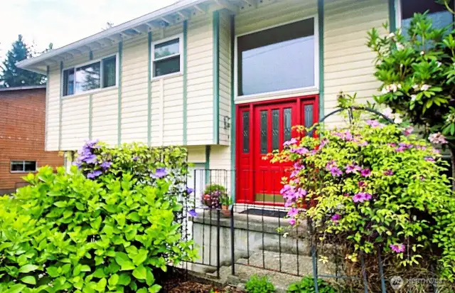 Charming curb appeal with mature landscaping and a welcoming front door—your next chapter starts here