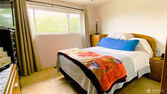 Spacious primary retreat with walk-in closet.