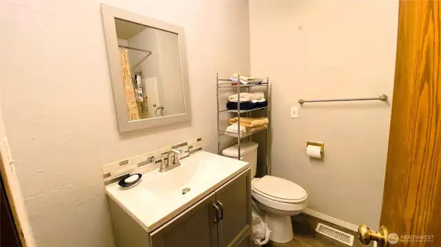 Functional main floor bath with room to refresh.