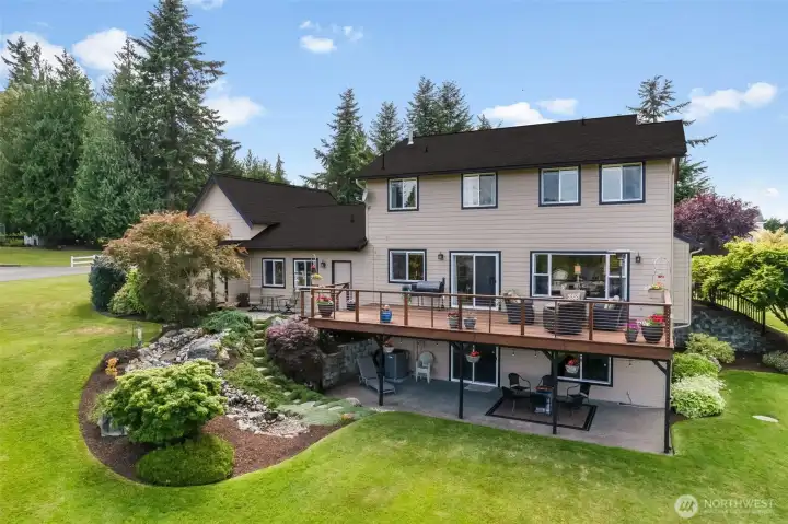 Large deck and covered patio great for entertaining a quick access to large corner lot Large deck and covered patio great for entertaining a quick access to large corner lot